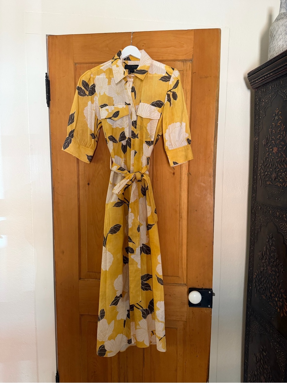 Floral flowy and summery button up dress.  NWT.  Beautiful print.